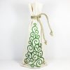 christmas wine bag with rope jute tie, front has green glitter decorative christmas tree on front
