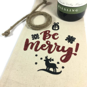 canvas wine bag says Be Merry for the holidays