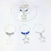 dallas cowboys gifts ideas include set of 4 silver star wine charms surrounded by team colors
