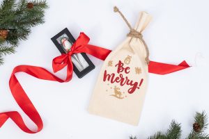 red and gold christmas wine bag