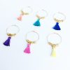 gold wine glass charms with colorful tassels