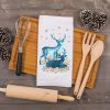 christmas tea towels featuring blue deer with silver and gold accents
